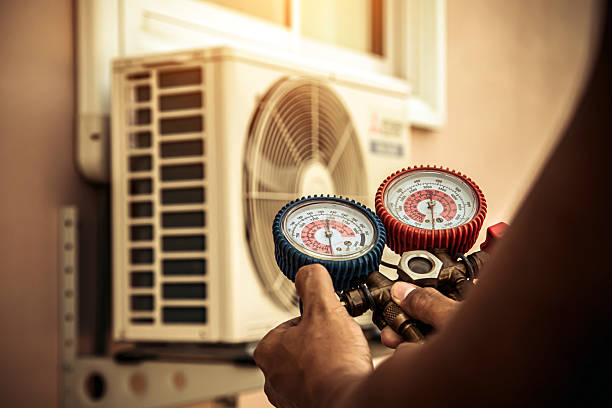 Professional Heat Pump Repair technician working in Chaplin, CT